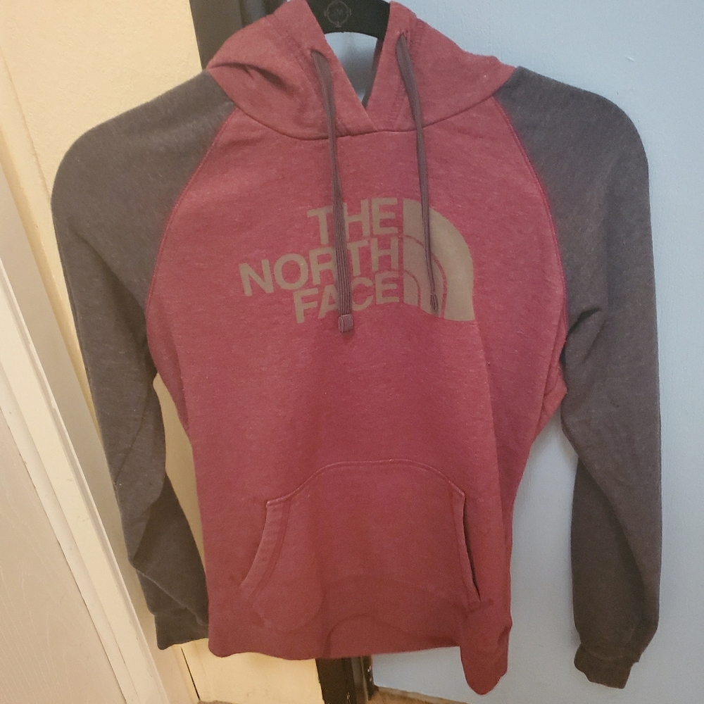 Red and black north face hoodie